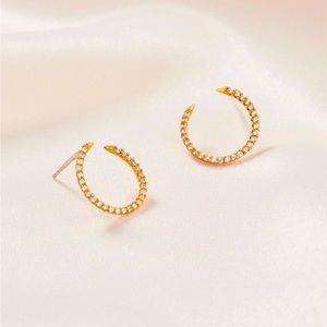 Stella & Dot Delicate Bypass Huggie Earrings, orig box.